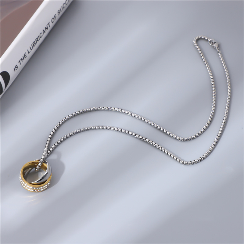A new cross-border stainless steel double-ring diamond necklace for men from Europe and America, featuring interlocking diamond inlays and titanium steel wool details Picture