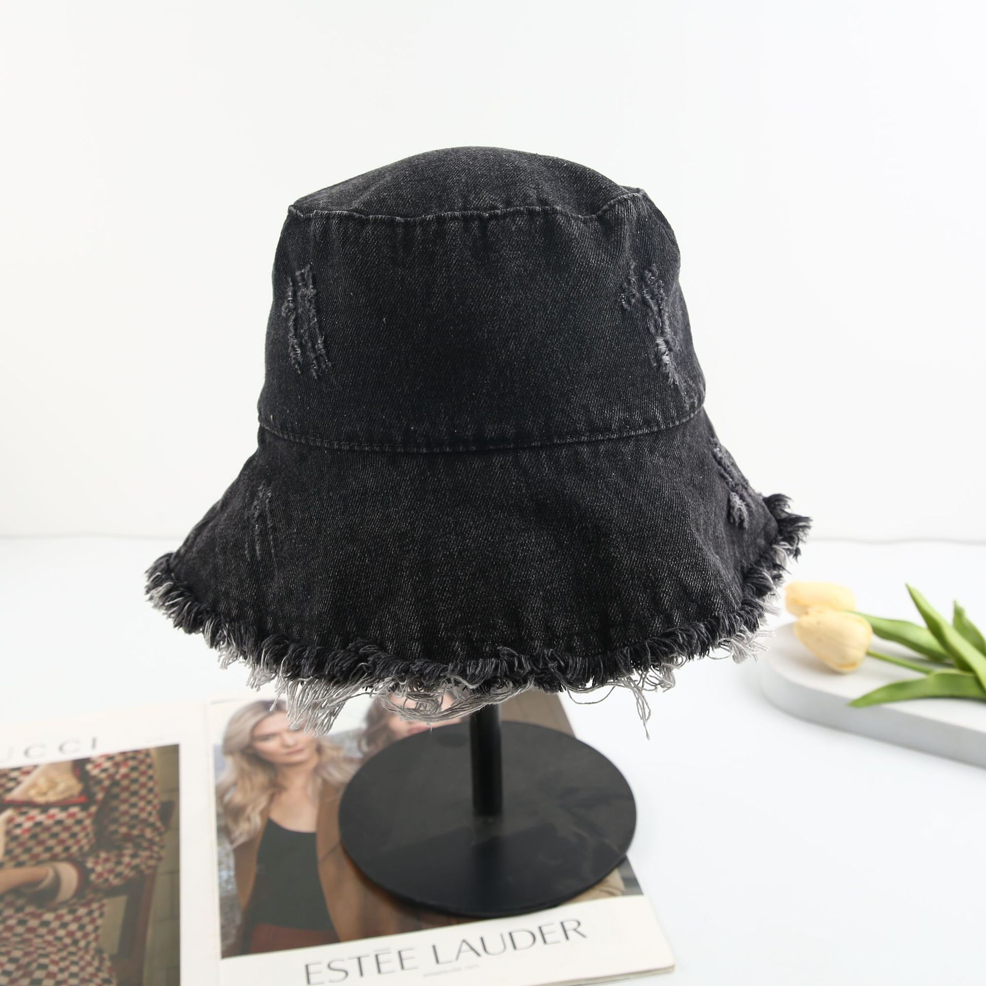 A stylish and versatile casual sun hat with a unique Japanese and Korean ins style, featuring a fringed denim fisherman's hat Application Scenario
