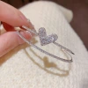This exquisite, fashionable and light luxury zircon heart-shaped double-layer open bracelet from Japan and South Korea is unique, versatile, and exudes a high-end and dazzling charm. It's a perfect accessory for women Specification image