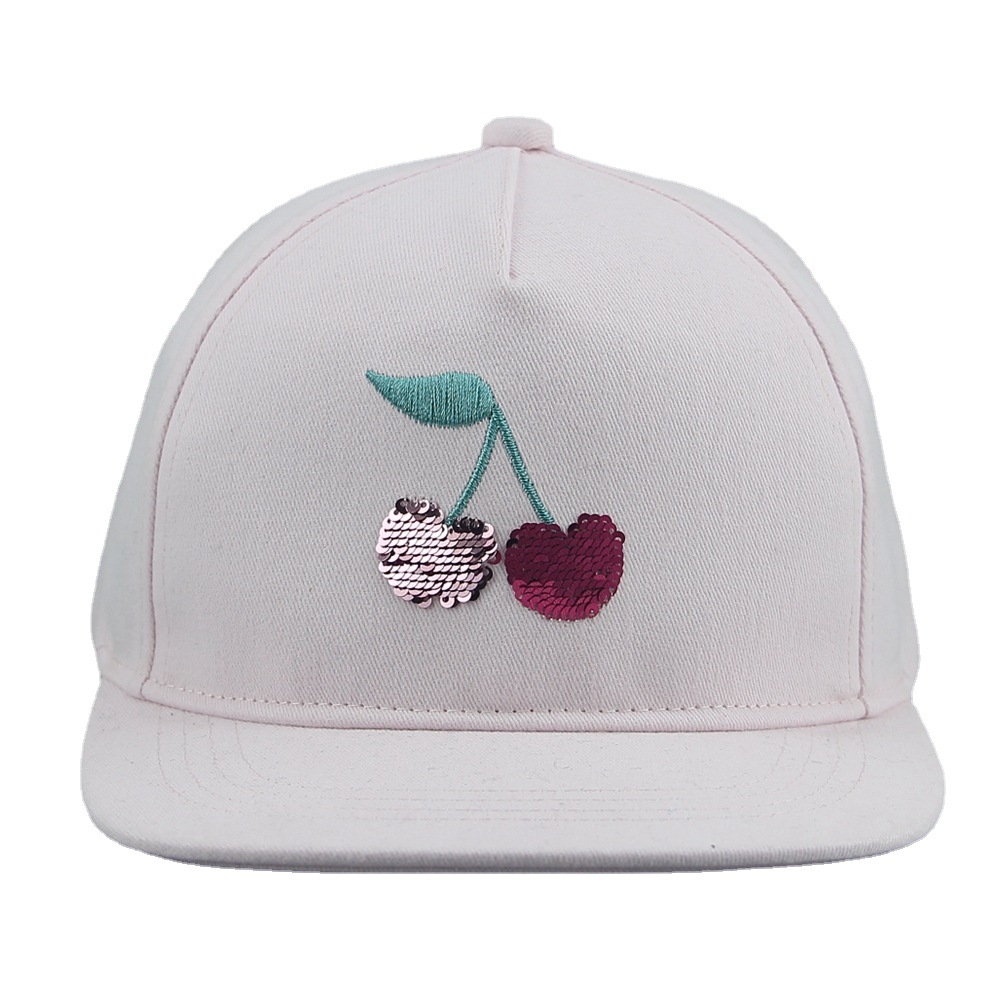 The hat factory processes children's hats, pink cotton cherry shade, cute embroidered sequined spring and summer net caps, breathable baseball caps