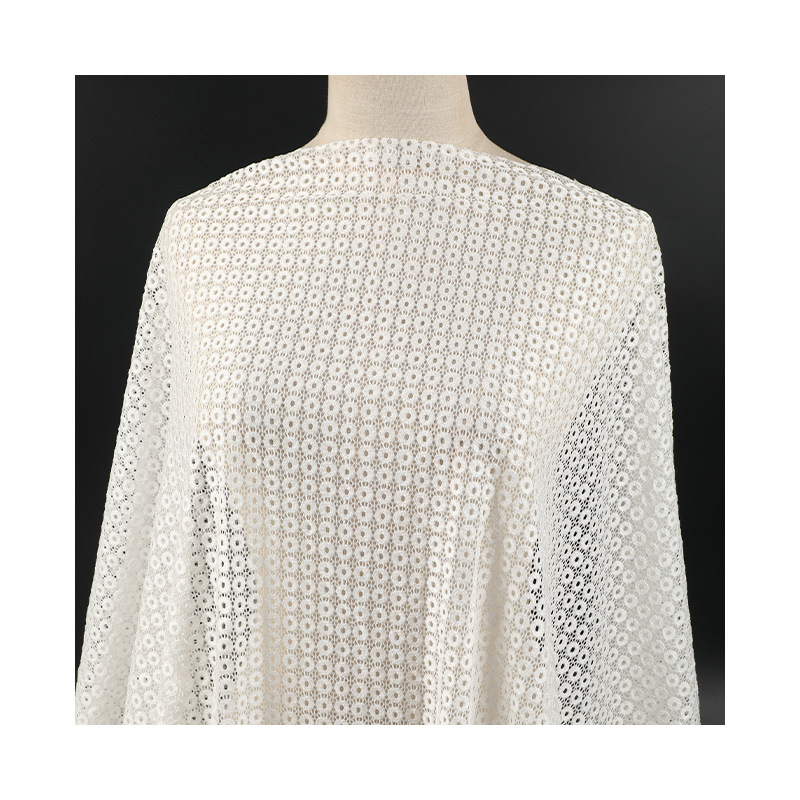 In stock, this is a denim elastic small copper coin lace fabric vest with a base layer for women's clothing. It is made of small circle lace fabric Application Scenario