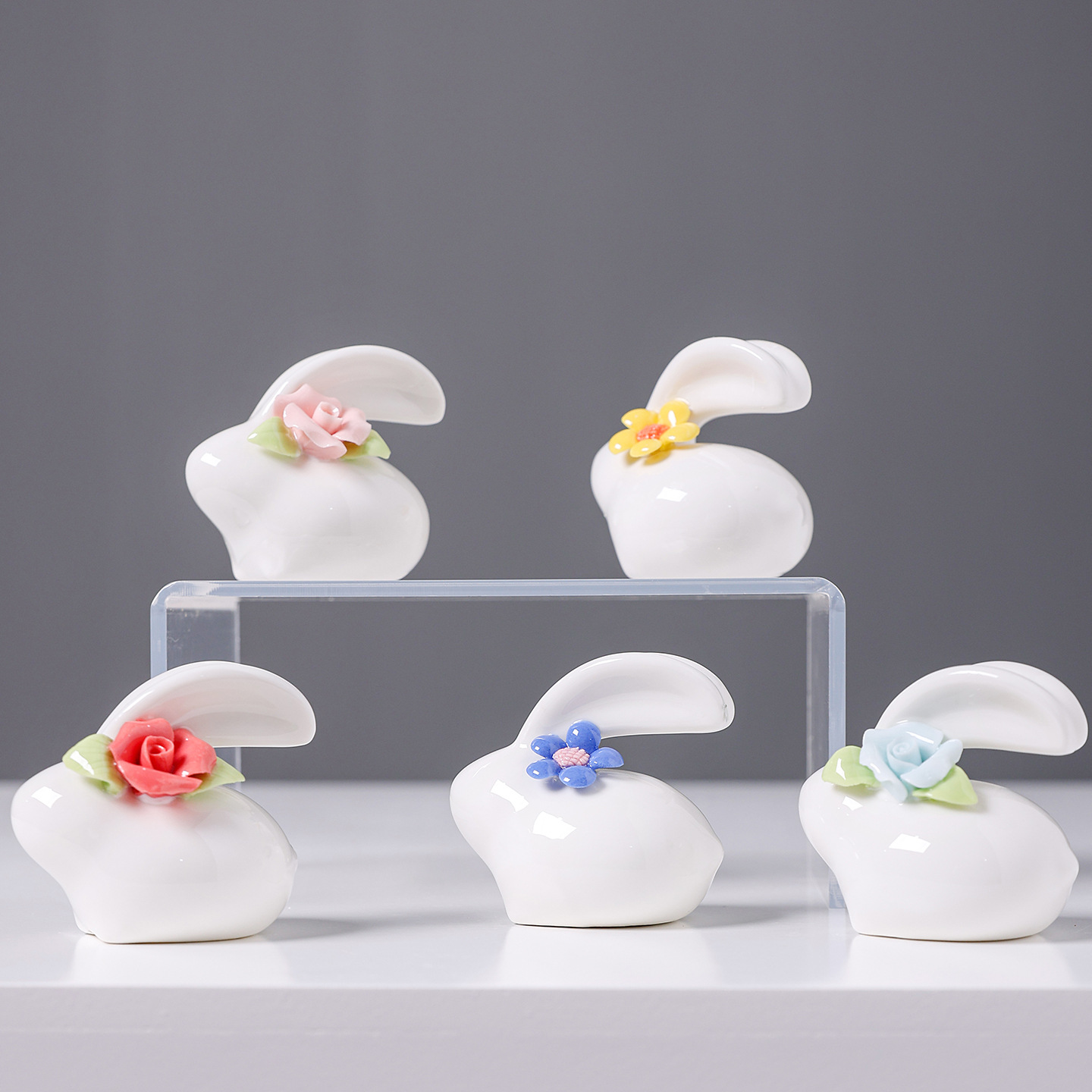 2026, a creative tea table and desk with cute mini porcelain flower decorations featuring hand-molded rabbit patterns made of jadeite white porcelain