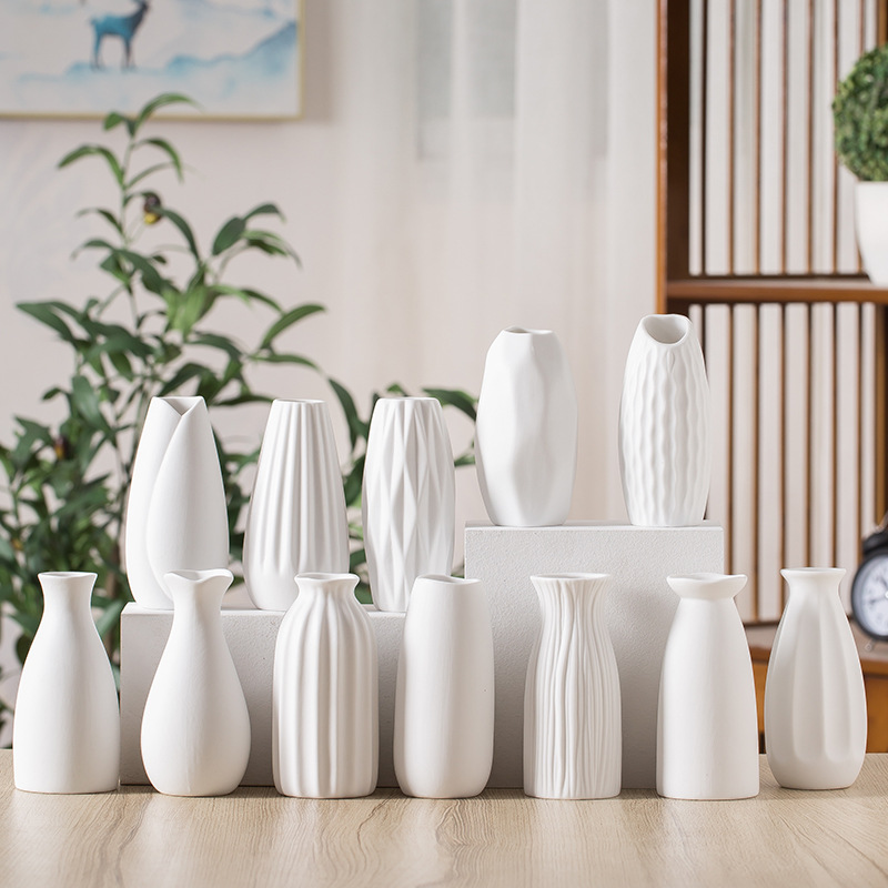 Wholesale of matte white ceramic flower arrangement vases in 2025, creative and simple living room home dried flower decorative items
