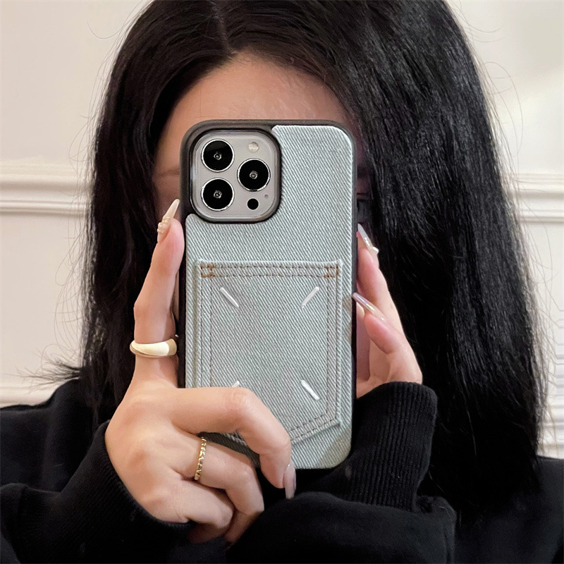 The 17promax phone case made of European and American denim card insert is suitable for iPhone16. It features a full leather cover with 15 embroidery and 14 hard case details Picture