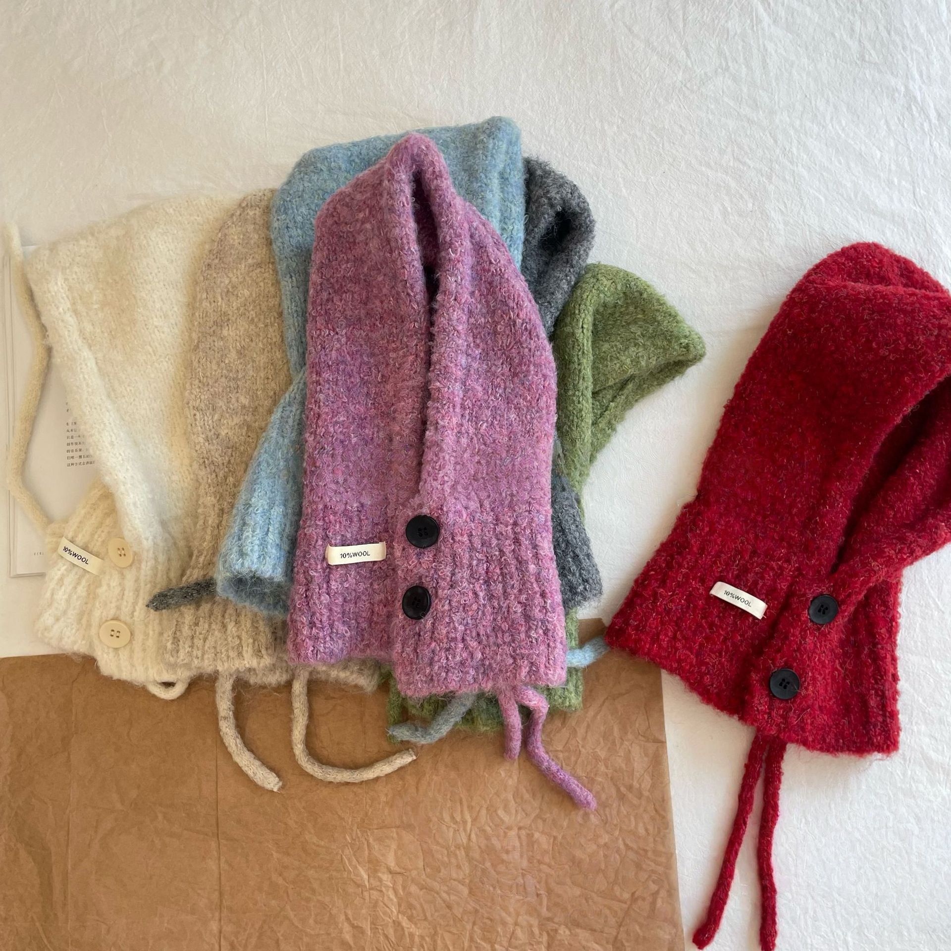 The new plush knitted hat for women in autumn and winter 2025 is a warm and ear-protecting striped Korean style that is versatile and can make the face look smaller Specification image