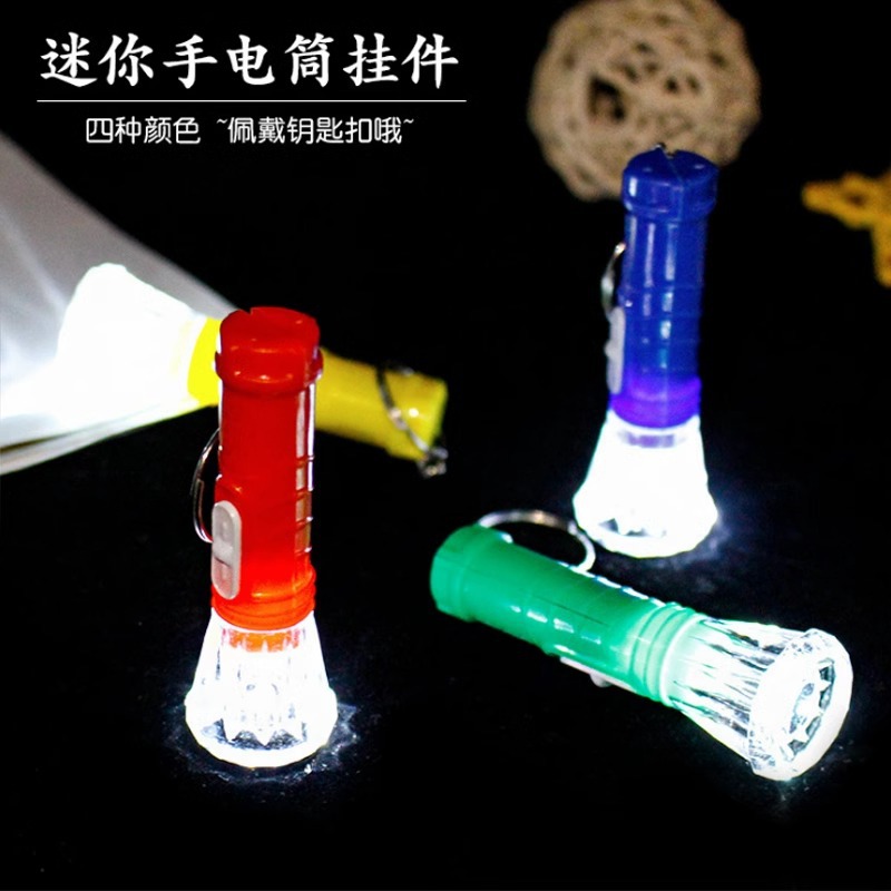 The portable flashlight keychain comes with a small battery and a replaceable electronic mini LED flashlight details Picture