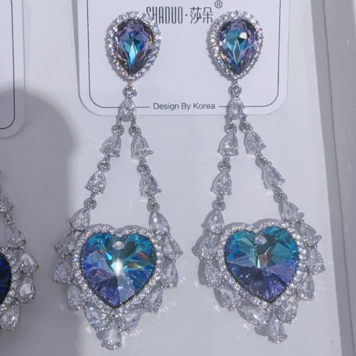 New color scheme: Fashionable and romantic heart-shaped S925 silver needle, European and American micro-inlay, light luxury, dazzling Austrian Swarovski crystal, high-end earrings, Korean Dongdaemun earrings, Ocean Heart, elegant live-streaming style Specification image