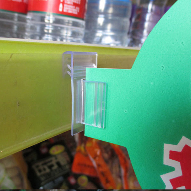 Estantes de supermercado clips de plástico de pvc canales clips de tarjetas promocionales clips de fijación de tarjetas de inserción clips de arco clips de plástico clips de dientes de clip pop clips de super canal avisos promocionales estantes de clip de fijación de etiquetas especiales soportes de fijación de mercaderías clips de punta details Picture