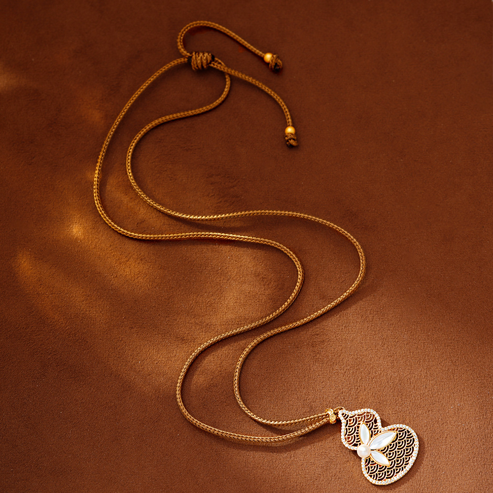 Hyacinth新中式国风葫芦吊坠项链女时尚轻奢小众设计贝壳仿珍珠秋冬毛衣链产品图