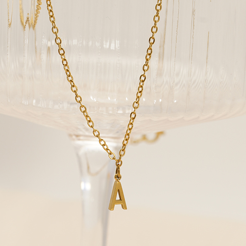 A new cross-border stainless steel necklace with 26 English letters from Europe and America, featuring a fashionable and simple letter pendant and collarbone chain details Picture