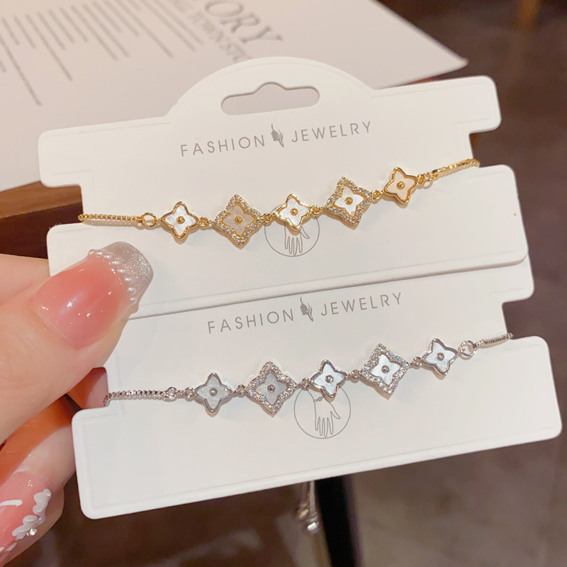 Micro-inlaid zircon shell petal adjustable pull-out bracelet for women, a niche and light luxury design accessory wholesale