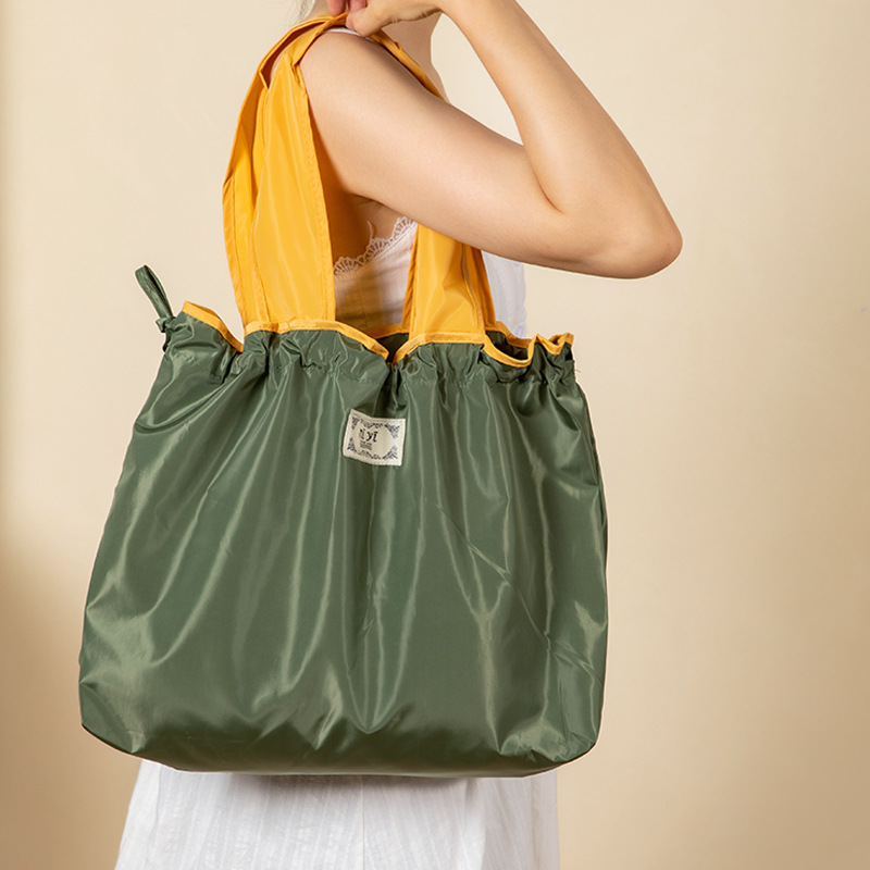Large drawstring eco-friendly supermarket shopping bag, fashionable single-shoulder bag, foldable portable handbag, vegetable shopping bag, waterproof details Picture