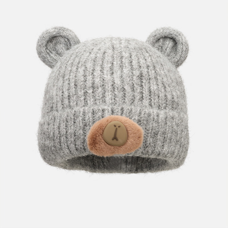 Korean-style cute bear knitted hat for students, versatile for autumn and winter, a small double-layer cold-proof, warm and ear-protecting knitted hat