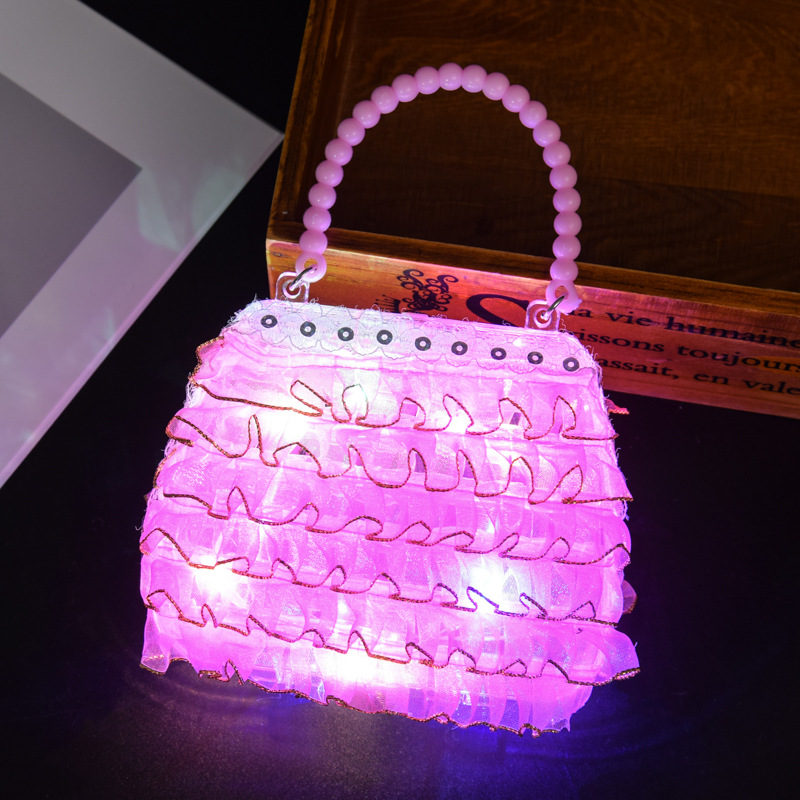 Children's luminous handbags, creative and handcrafted toys for kids to play house, are selling well at street stalls, night markets and squares details Picture