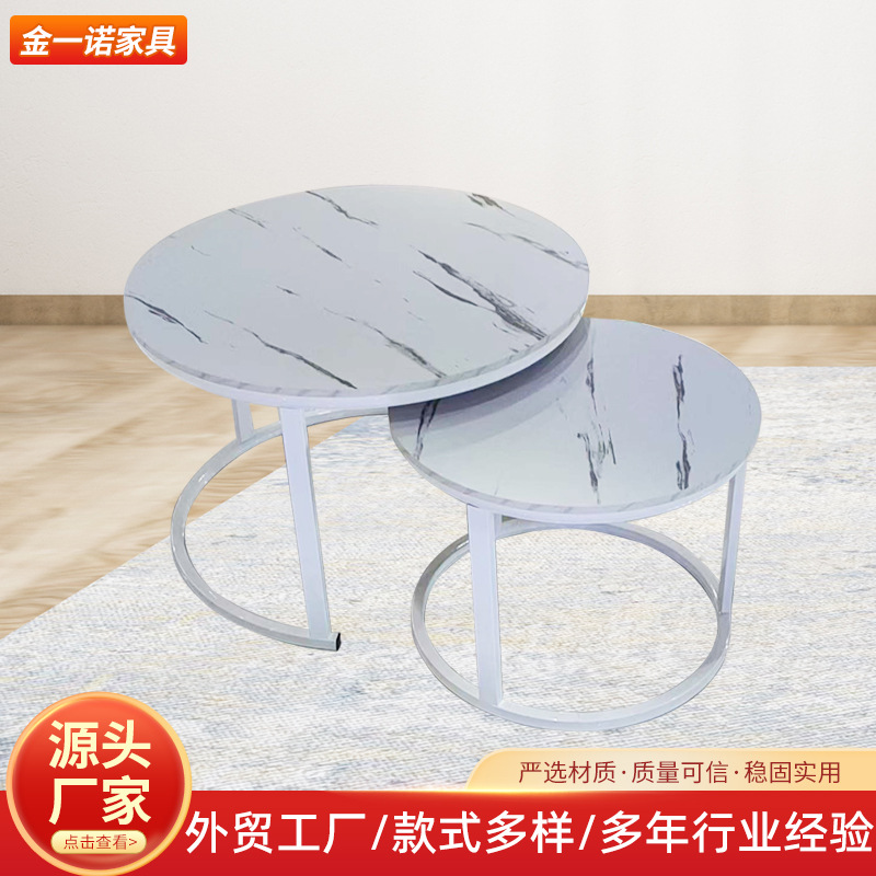 A light luxury minimalist coffee table with a round table for small-sized apartments. A creative rock plate round coffee table set for the living room