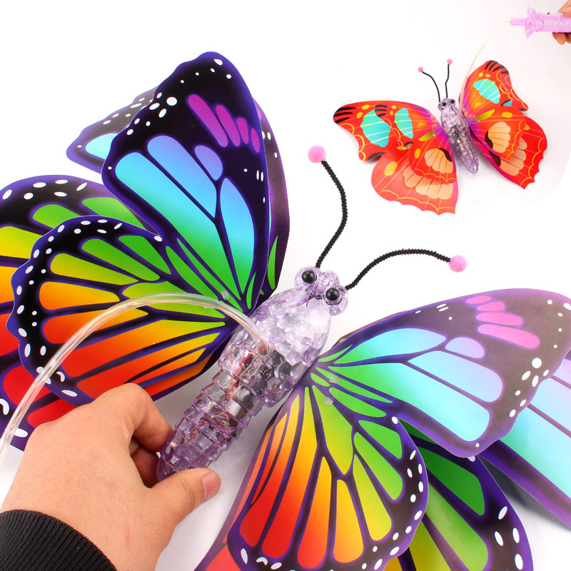New electric butterfly children's toy with luminous hand-held wings, luminous music, moving and flashing butterfly wholesale Application Scenario