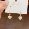 Douyin's popular fashion, clear and transparent cat's eye stone heart-shaped ear buckle women's summer new style, high-end, versatile and sweet earrings Application Scenario