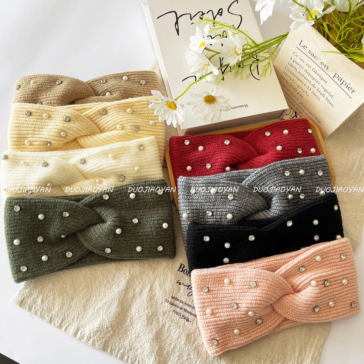 A fashionable and warm knitted cross headscarf featuring a new autumn and winter pearl woolen hair band with elastic edges for cold protection Application Scenario