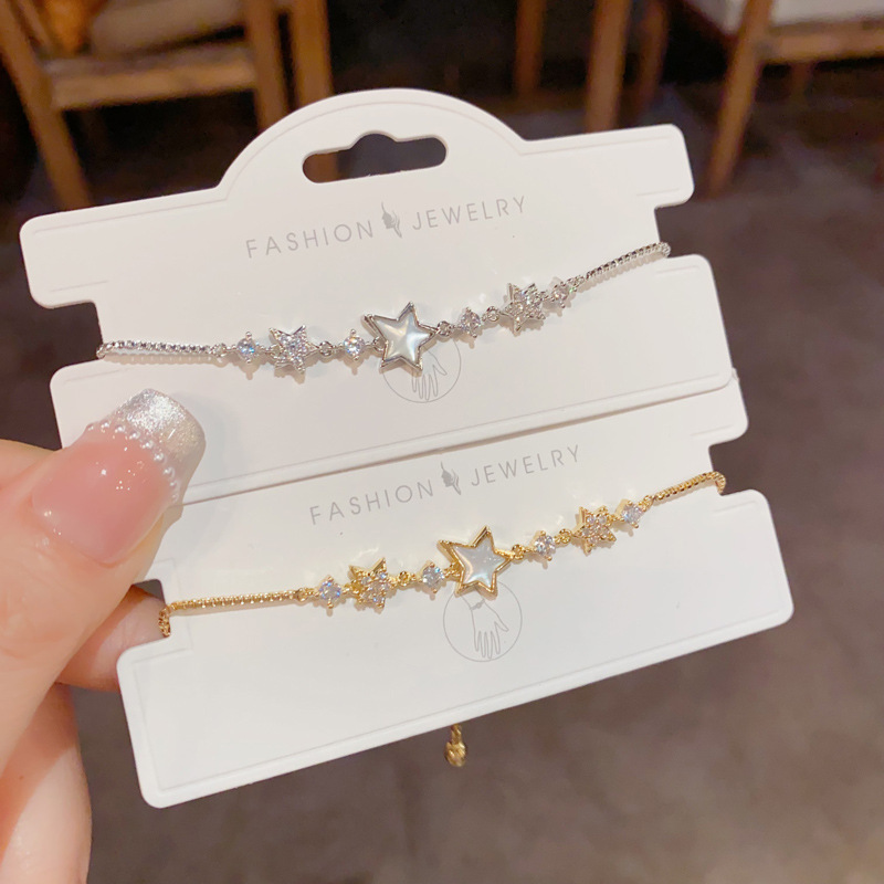 Nicho de moda diseño sentido micro circonitas madre de cinco puntas pulsera temperamento luz extravagancia versátil superflash accesorios de mano al por mayor