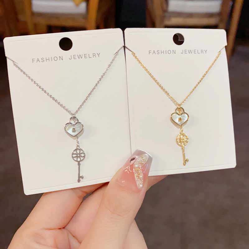 Korean style, fashionable design sense, heart lock, key, tassel pendant necklace, unique, light luxury, versatile collarbone chain for women