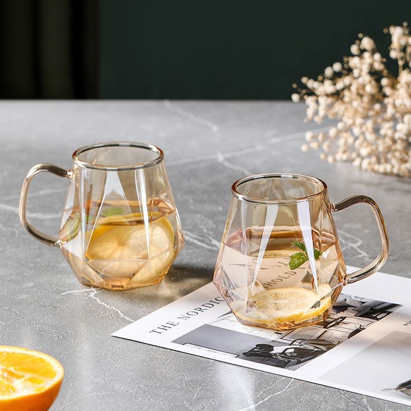 Champagne-colored hexagonal diamond glass cup, creative and individual hexagonal juice high borosilicate glass cup, household water cup with handle Specification image