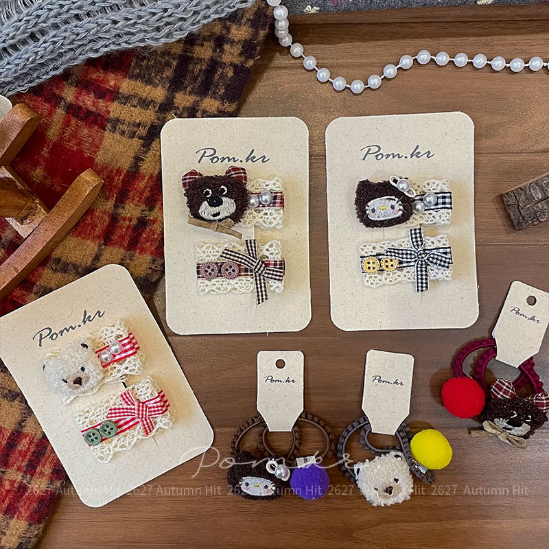 Nuevo estilo de dibujos animados coreanos osos pinza mano para niños lateral pelo roto pinza flequilla bola de pelo lindo anillo de pelo elástico mujeres Pom.kr peluche adornos de pelo peluche peluche peluche erizo plaid encaje decoración chica otoño details Picture