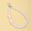 New acrylic pearl cute bow tie, handcrafted beaded mobile phone pendant chain, keychain, bag chain, fashionable accessory batch Application Scenario