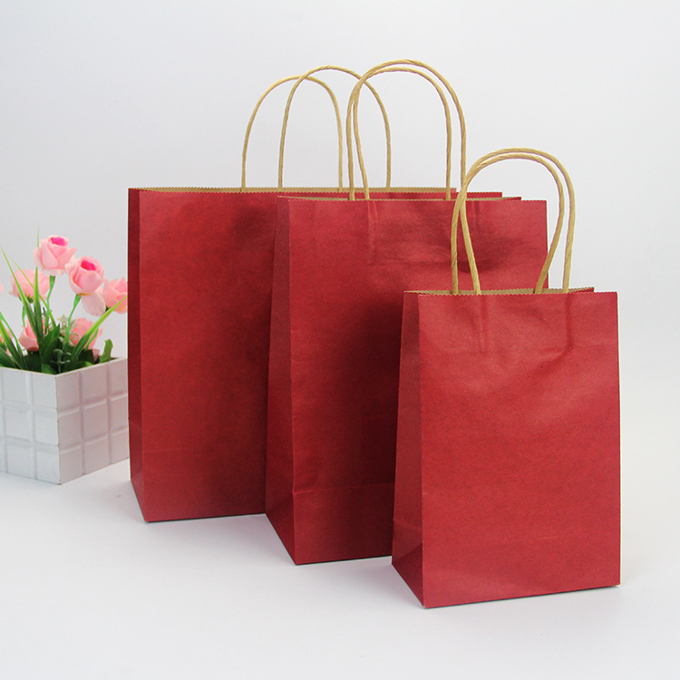 In-stock colored hand-held gift bags, clothing shopping bags, takeout packaging bags, window-opening wine bags, kraft paper bags with logo printing Application Scenario