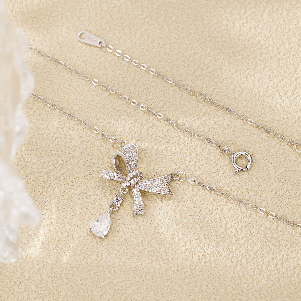 s925 Silver Full diamond bow necklace, women's ins light luxury and niche design sense pendant sweater collarbone chain Application Scenario