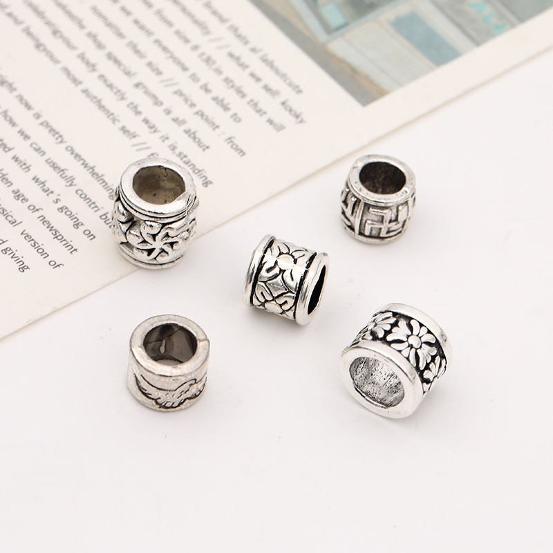Wholesale of retro Tibetan silver patterned auspicious cloud pattern bucket beads, partition beads, wheel beads, diy handcrafted bracelets and accessories