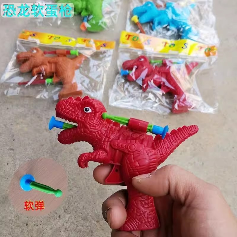 Children's dinosaur catapult soft bullet gun, boys' outdoor creative toys and gifts, hot selling toys and small gifts at the street stall Application Scenario