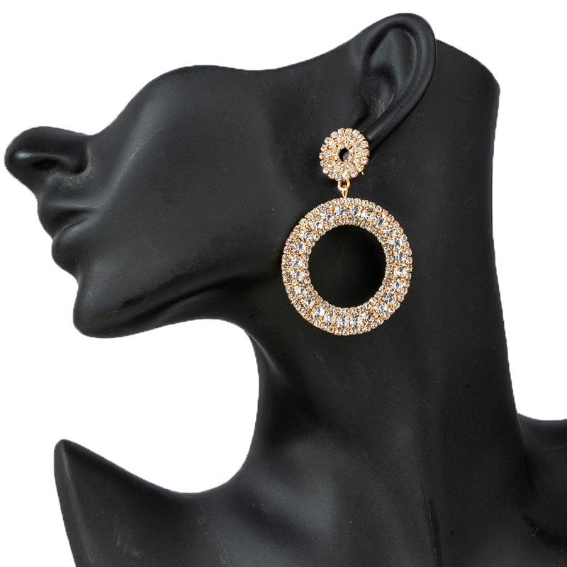 The manufacturer's supply of personalized and exaggerated round pendant rhinestone earrings for women, geometric shape luxurious and shiny diamond-encrusted pendant earrings long and elegant for women full figure