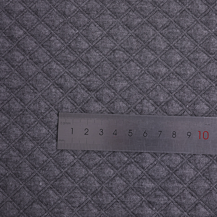 In stock 32s air layer jacquard fabric, diamond-shaped polyester checkered jacquard fabric, warm baby and children's crawling clothing fabric details Picture