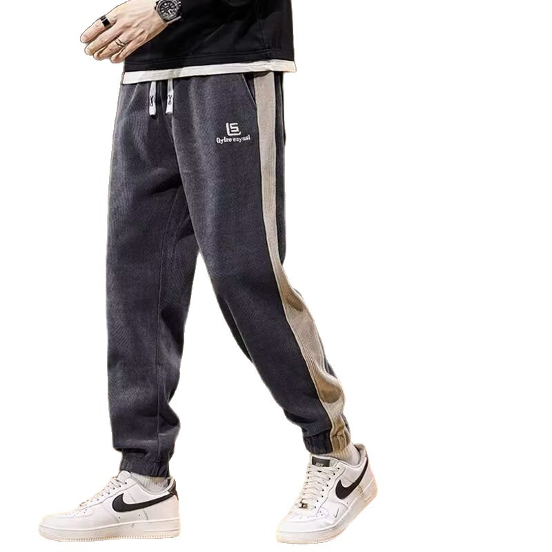 The men's autumn and winter new style of corduroy pants is trendy and cool. The large-sized sportswear pants are loose, versatile and have a tight hem Item Picture