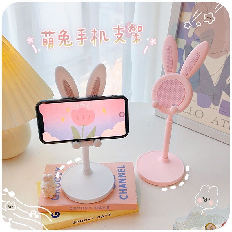 The little Rabbit mobile phone stand is a desktop adjustable and lift-up support stand for lazy selfies and live streaming. It is a cute cartoon support stand details Picture