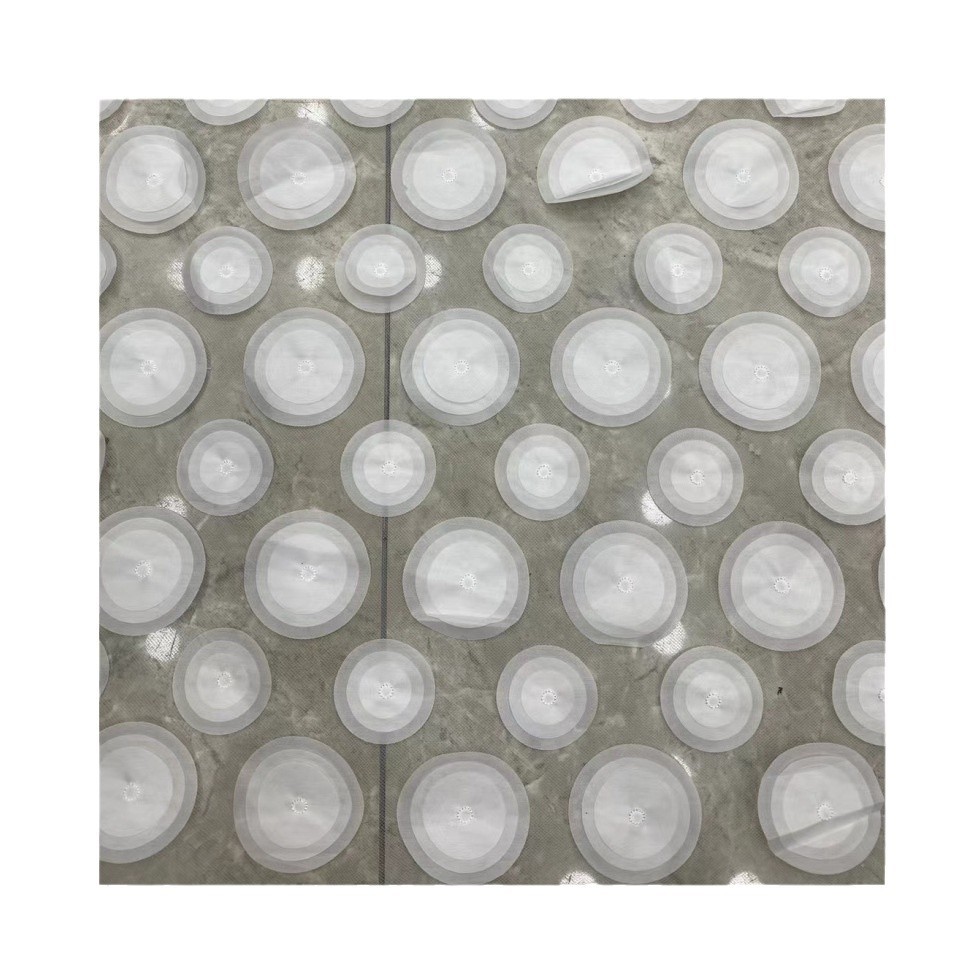 欧洲站激光立体刺绣面料多色网纱圆圈绣花布时尚女装连衣裙面料白底实物图