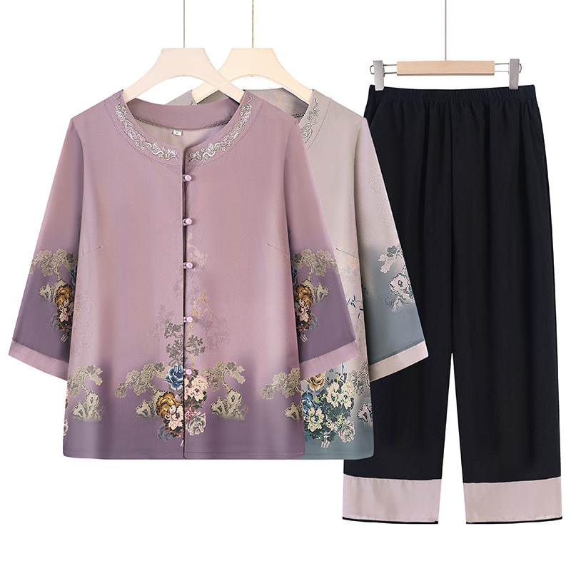 A purple embroidered sportswear top with a Chinese trend and black seven-point yoga pants for a slimming, breathable and casual look Item Picture