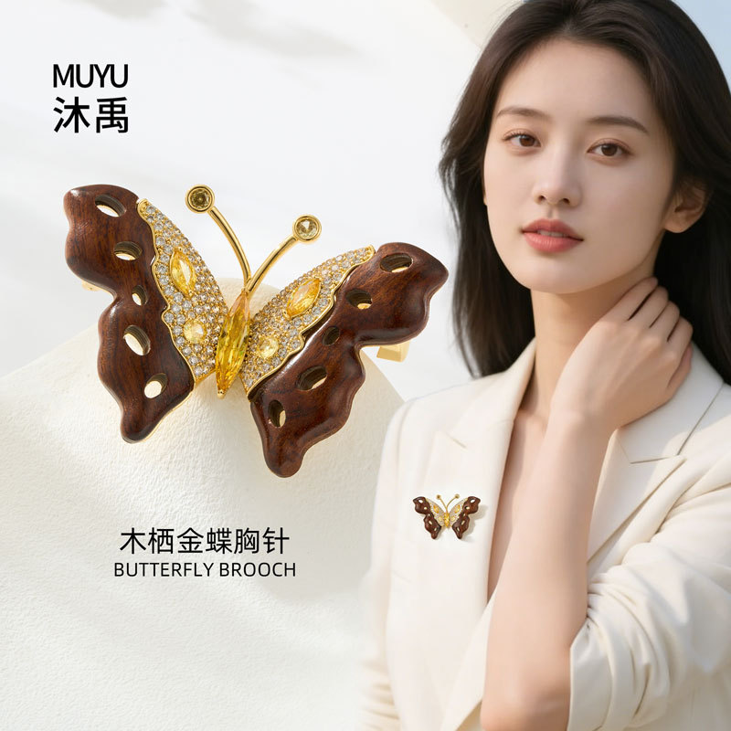 A light luxury retro wooden butterfly brooch made of copper alloy with slightly inlaid zircon, exuding a sense of high-end and exquisite clothing. A new type of brooch and corsage details Picture