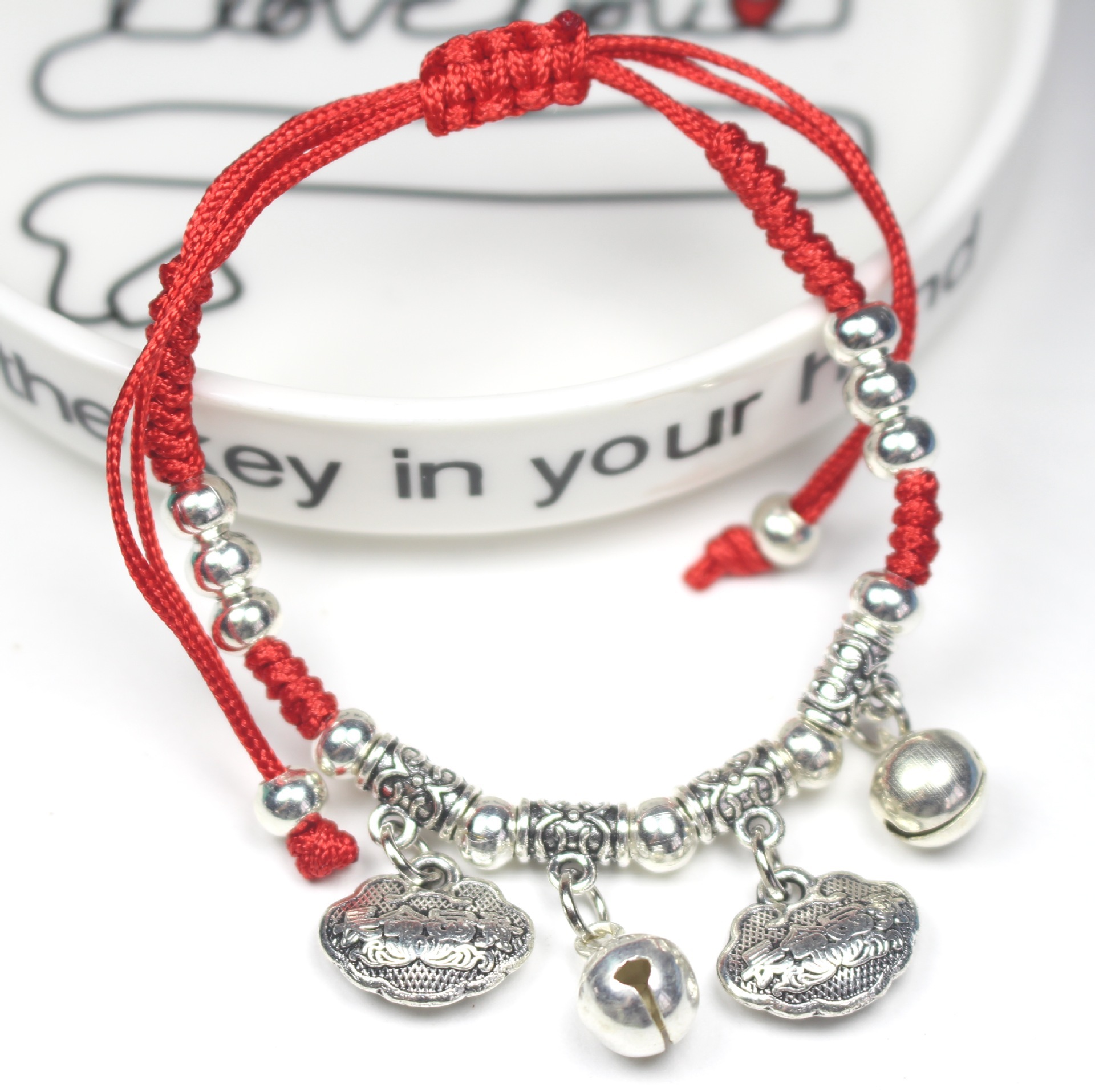 The zodiac year imitation Tibetan silver red rope bracelet and ankle bracelet, traditional Chinese hand-woven Miao silver bracelet, best friend and couple bell jewelry details Picture