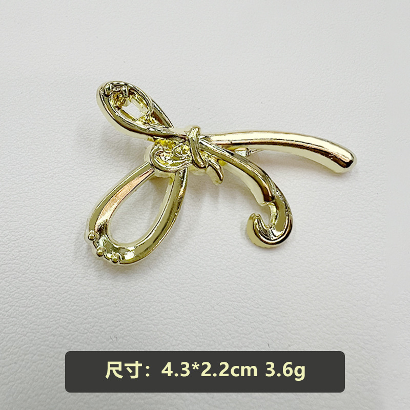 欧美时尚蝴蝶结合金胸针ins风设计感毛衣外套西装配饰别针胸花潮白底实物图