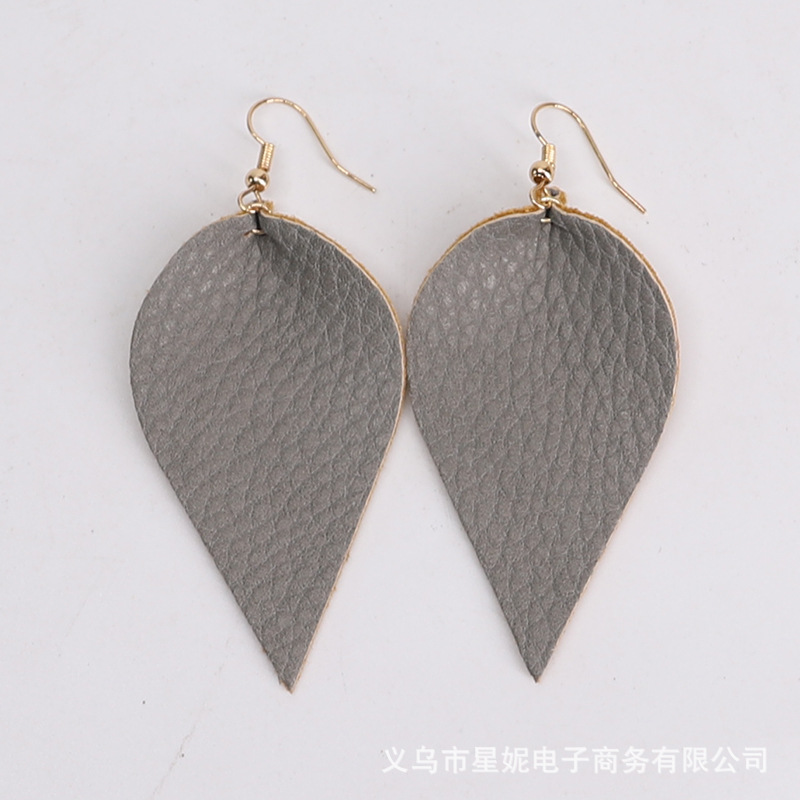 Fine-grained pu leather leaf style earrings, popular in Europe and America. Simple and exquisite pu leather leaf earrings, cross-border e-commerce supply details Picture