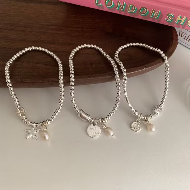 S925 sterling silver simple and elegant starfish smiling face pendant beaded bracelet, light luxury, niche and exquisite, a perfect accessory for your best friend details Picture