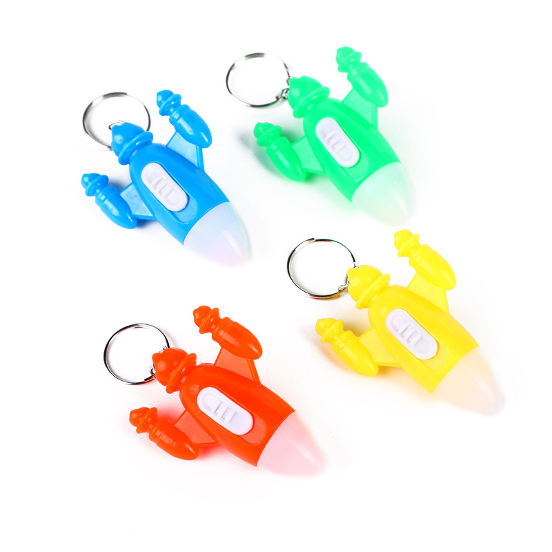 Wholesale of plastic small flashlights, wall-mounted luminous lamps, colorful spaceship keychains, led lights, flashlights and luminous gifts Specification image