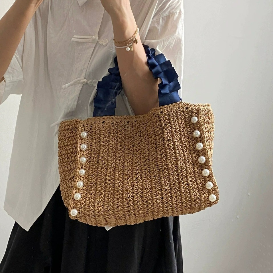 Bolso de paja transfronterizo bolso de paja de mano perla bolso de paja de mano tejido a mano bolso lánguido bolso de mujer bolso de playa de viento vacacional bolso casual tote bolso de paja hecho a mano details Picture