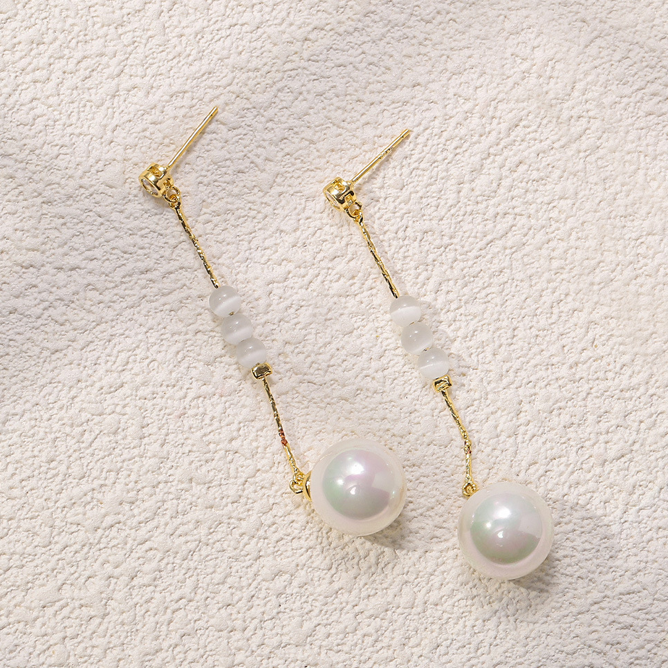 Gentle and refined tassel pearl earrings, women's Instagram niche design sense cat's eye stone earrings, high-quality earrings wholesale details Picture