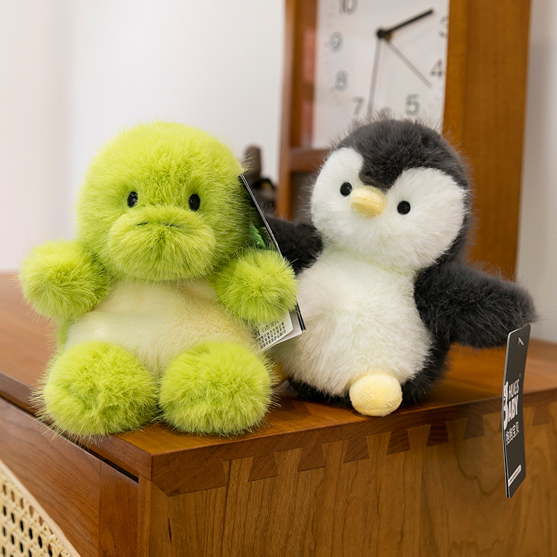 Wholesale of creative new puff series plush toys, seal and penguin animal figurines, children's gifts, and doll table companions Specification image