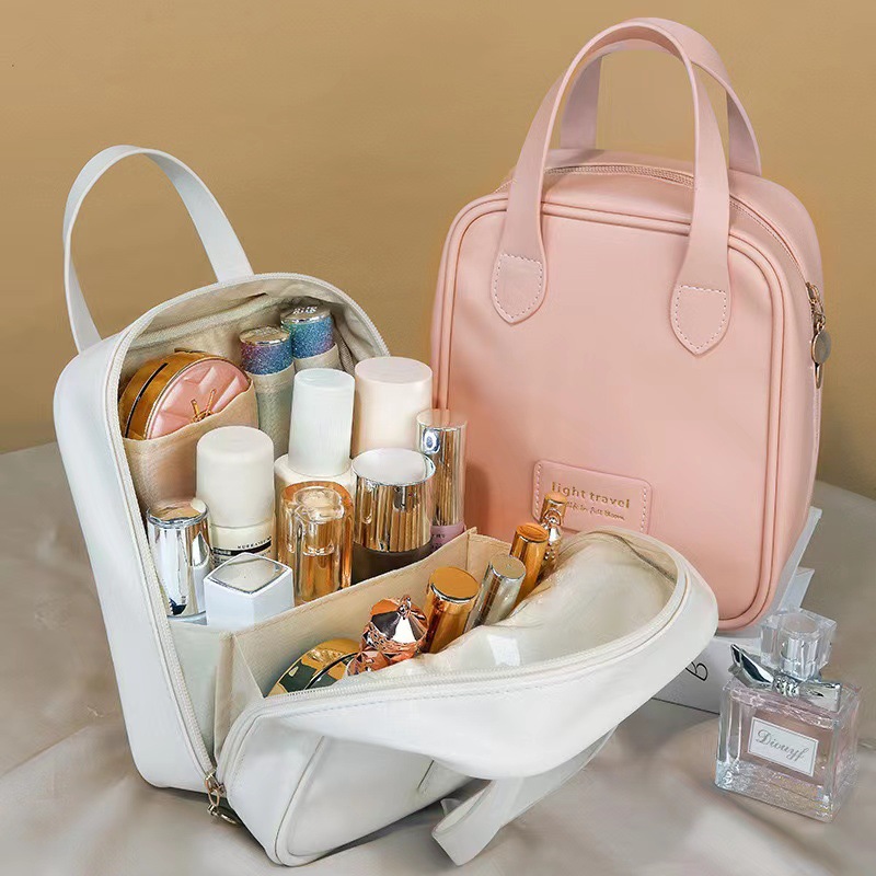Cross-border PU travel makeup bag, women's skin care products and cosmetics storage bag, large-capacity portable toiletry and makeup bag, hand-held