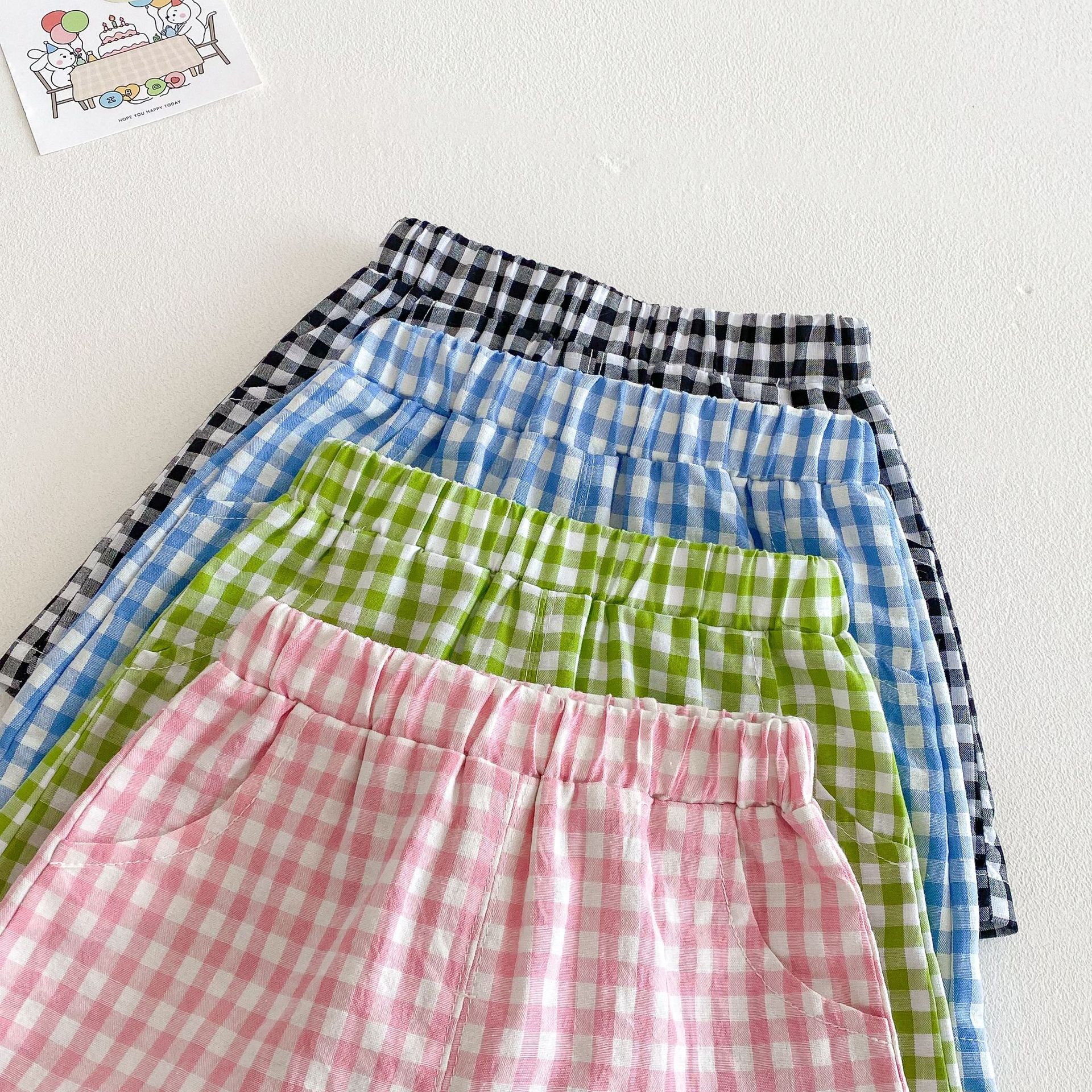 Children's cartoon set, Little Left and Little Right, summer girls' stylish short-sleeved T-shirt, thin boys' plaid shorts two-piece set Application Scenario