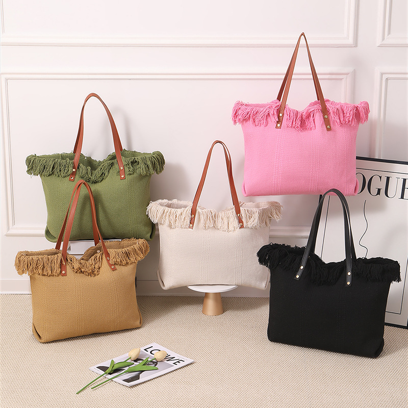 Cross-border canvas bag, fringed handbag, large-capacity portable and simple fringed tote bag, large-capacity simple hand-held shoulder canvas bag, commuting woven beach bag, women's canvas bag Specification image