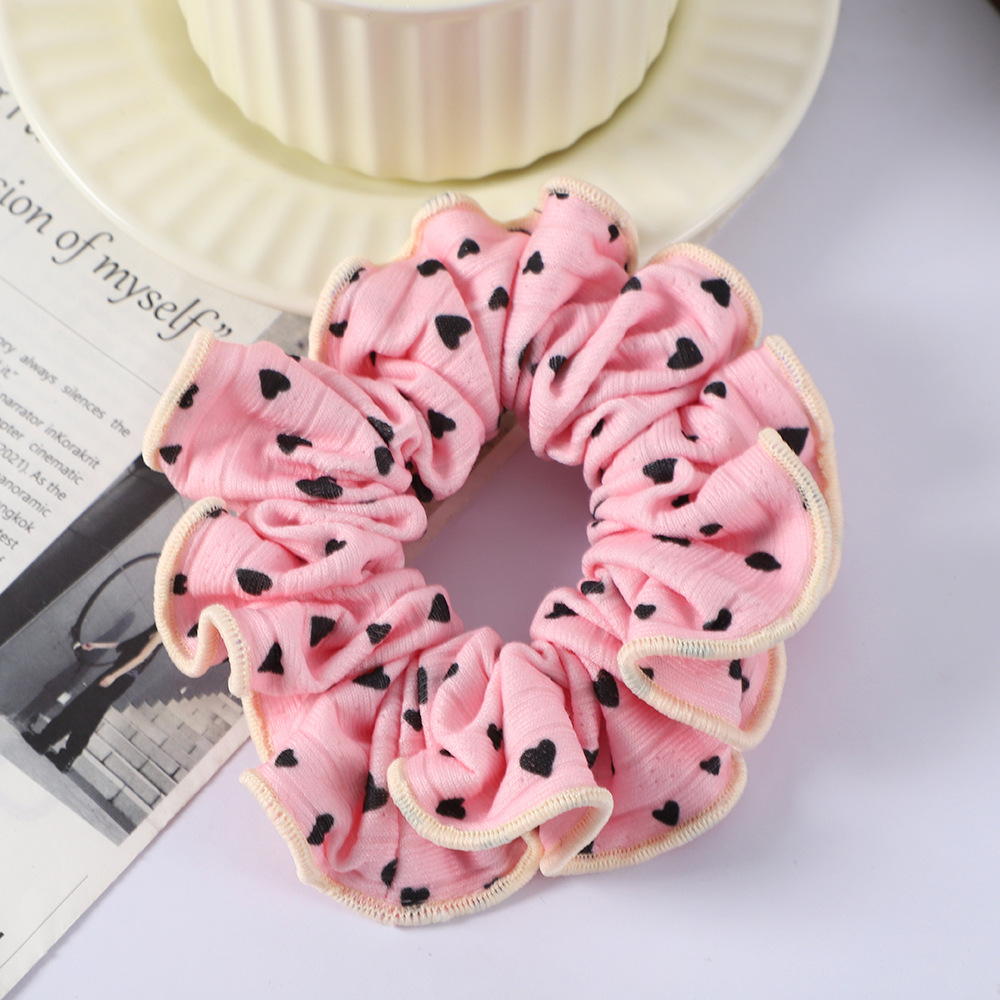 Wholesale of autumn and winter small floral hair bands, Korean-style knitted large intestine bands, high-elasticity and durable, sweet school-style ponytail hair ties Application Scenario